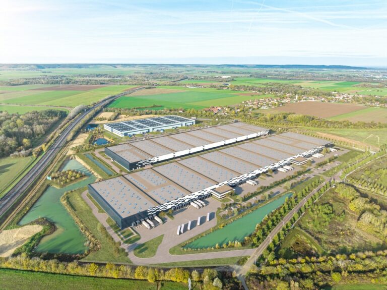 Vue 3D drone (vue d'architecte) d'un parc logistique moderne entouré de zones agricoles - photographie aérienne pour immobilier industriel